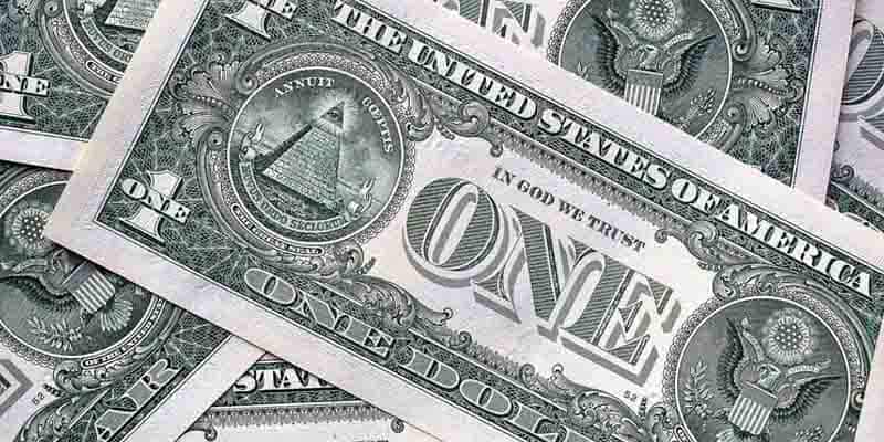 Dollar bill pile